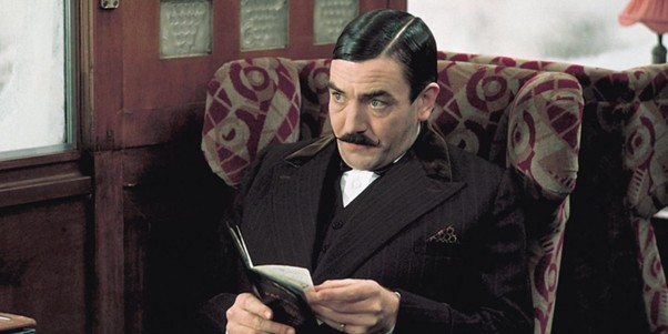 In Murder on the Orient Express (1974) as Hercule Poirot